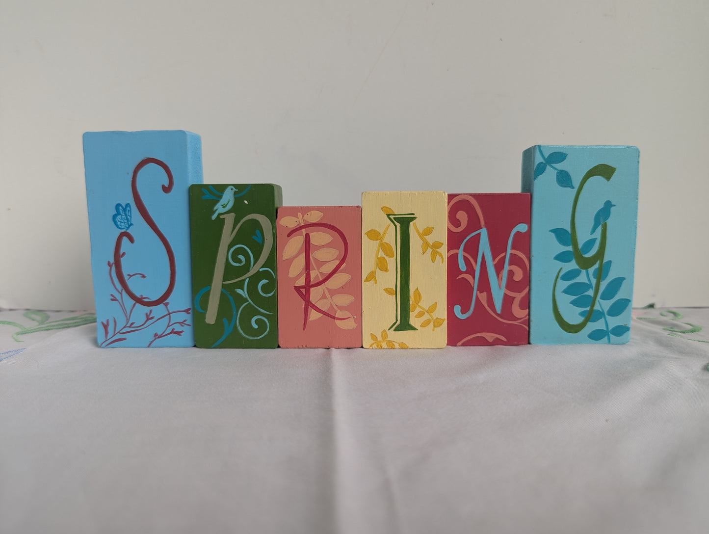 Janet Staples 2015 Wooden Blocks Spring Sign