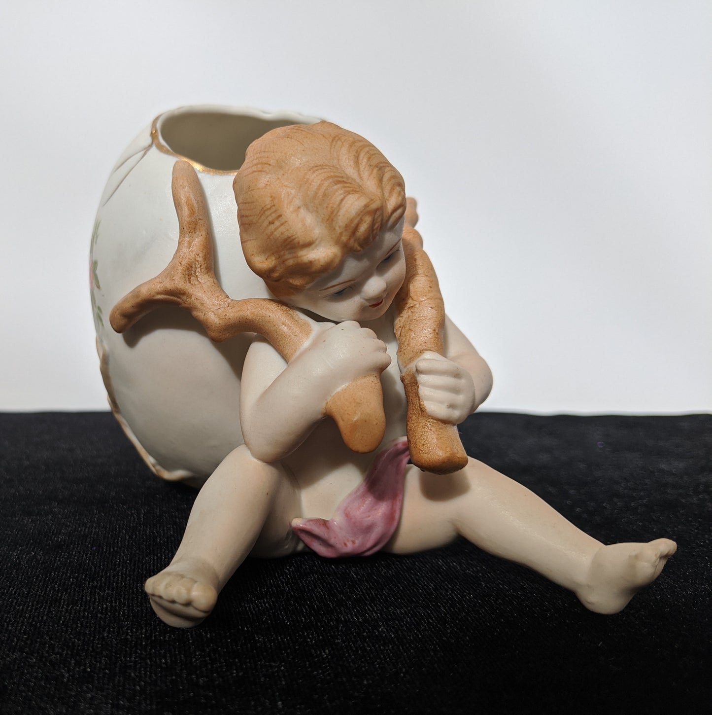 UCAGCO China Ceramic Boy with egg candy dish