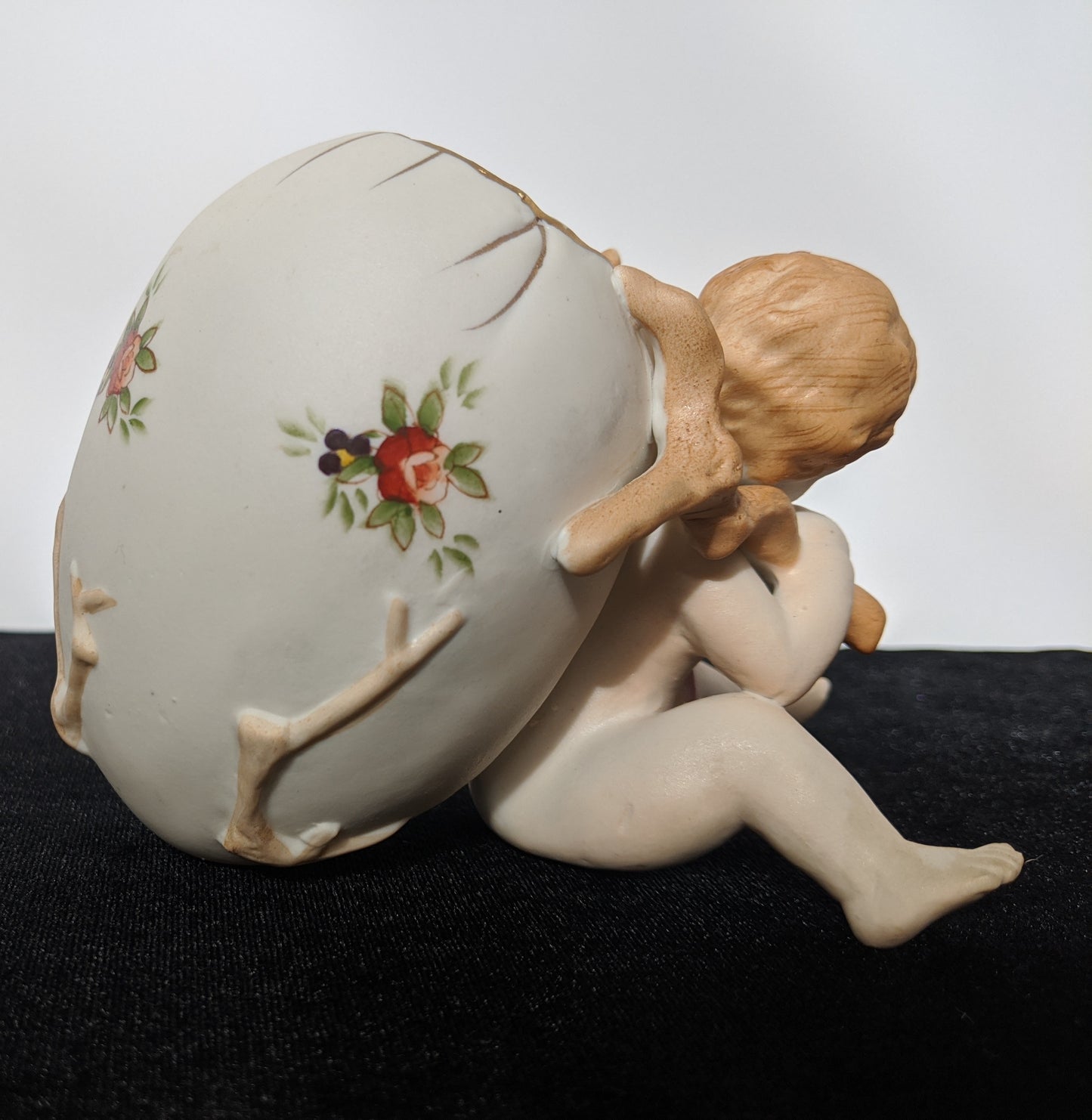 UCAGCO China Ceramic Boy with egg candy dish