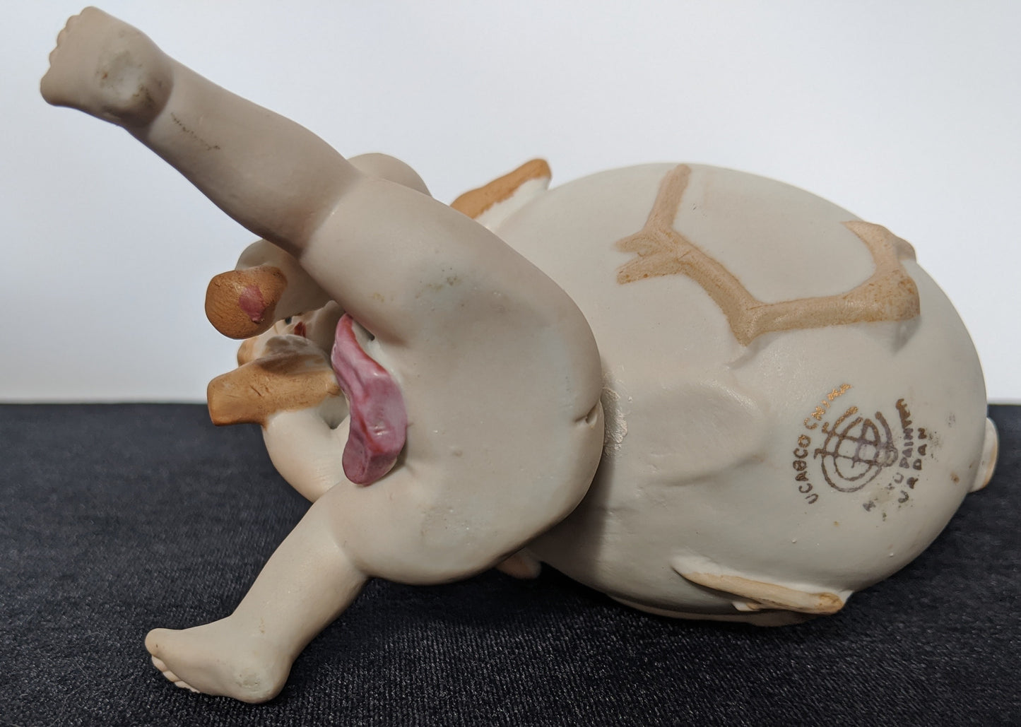 UCAGCO China Ceramic Boy with egg candy dish