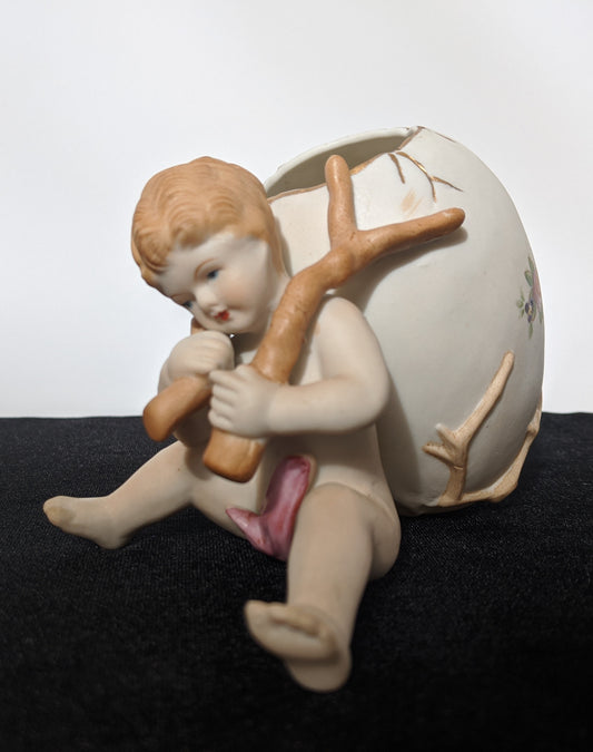 UCAGCO China Ceramic Boy with egg candy dish