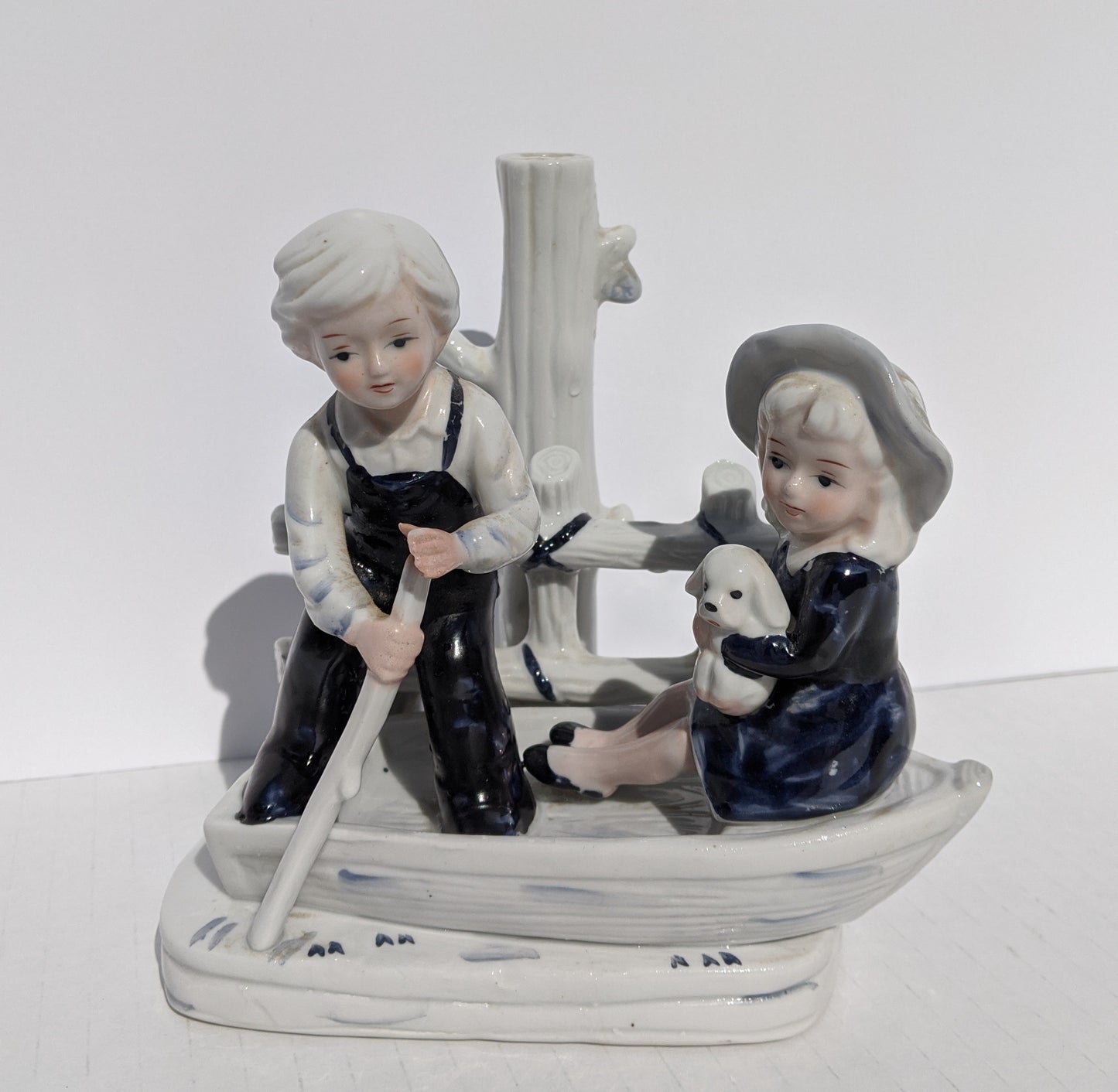 Blue Boy and Girl on Boat Vintage Figurine