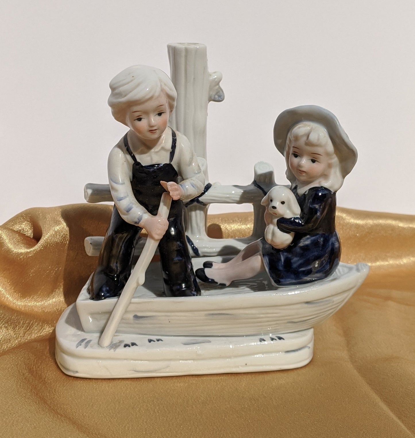 Blue Boy and Girl on Boat Vintage Figurine